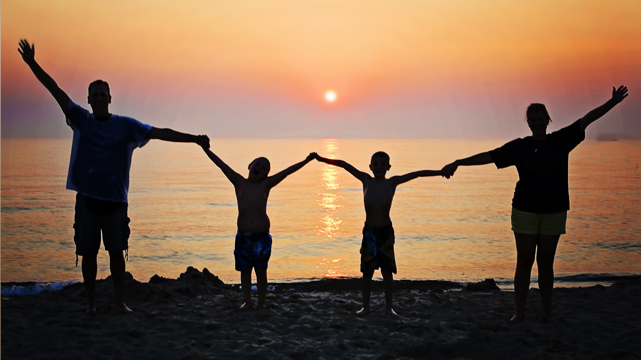 a family by Georgian Bay after completing their mortgage renewal
